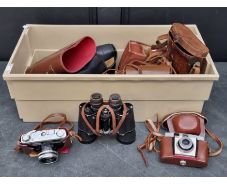 Cameras: a Yashica Lynx-1000; together with other vintage cameras and binoculars. 