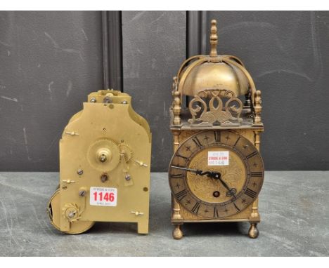 A lantern style timepiece, 24.5cm high; together with a fusee clock movement. (2)