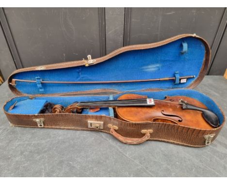 A Continental violin, labelled 'Made In Czechoslovakia, The London Violin Co...', with 14in one-piece back, with bow, in case