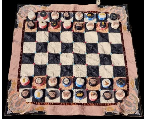 An unusual vintage hand embroidered cotton and silk children's 'chess style' game, comprising: a playing mat approx 120cm x 1