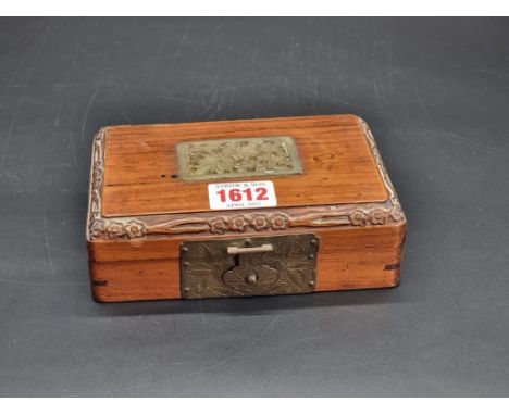 A Chinese hardwood and jade inset casket, 15cm wide, enclosing a part set of 27 ebony and mother-of-pearl dominos.