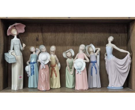 Eight Lladro figures, largest 37.5cm high.