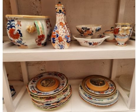 A large quantity of Masons and other similar ironstone china; together with Prattware, (some damage). (two shelves)