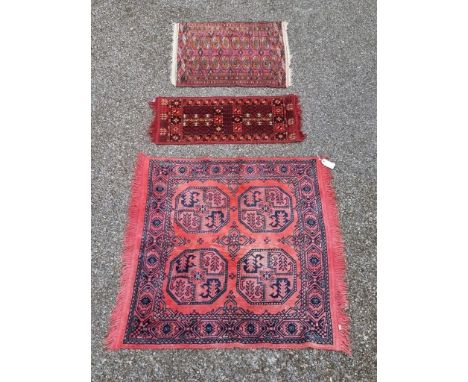Three small Persian rugs, largest, 102 x 96cm.