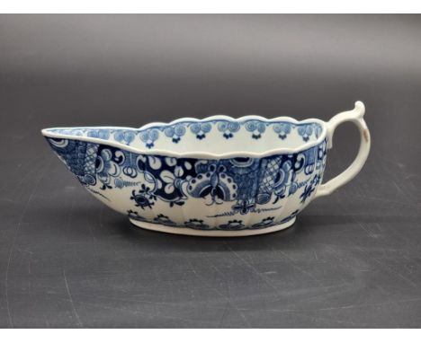 A Worcester First Period 'Doughnut Tree' pattern fluted sauce boat, 18.5cm long.