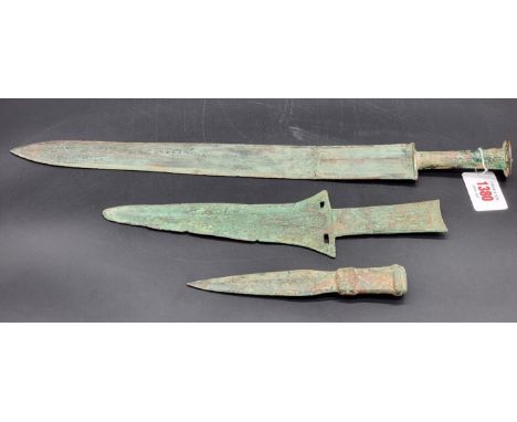 Antiquities: a Chinese Archaic verdigris bronze short sword, Han Dynasty, 45cm long, (repaired); together with a Warring Stat