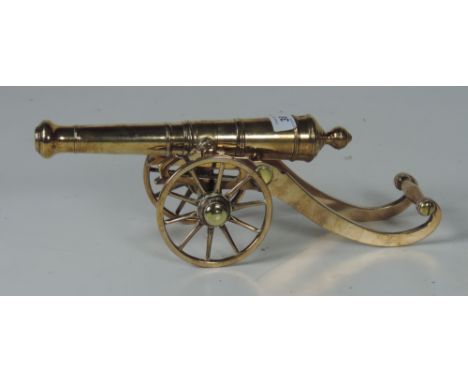 A good quality late 19th Century all brass Desk Cannon, 38cms (15") long. (1)