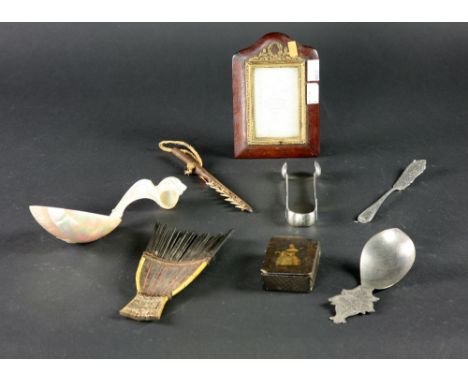 Box: An Irish Georgian silver Sugar Tongs, a silver Butter Knife; a small papier mache Snuff Box; a South Sea Island Comb, a 