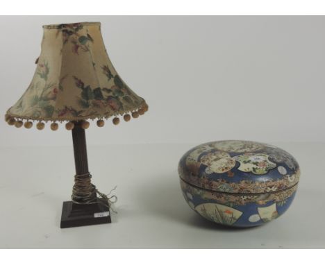 A brass Corinthian style Table Lamp, and a large Japanese porcelain Bowl and Cover, with faults. (2)