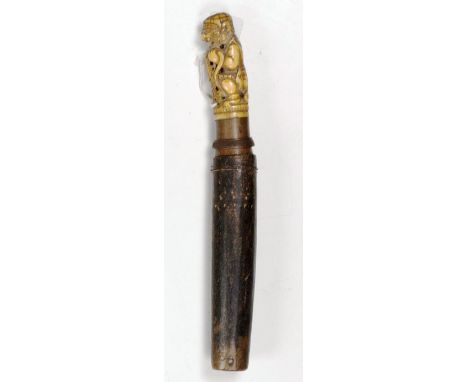 A rare Oriental Knife, with an early finely carved ivory handle, and later wooden scabbard. (1)