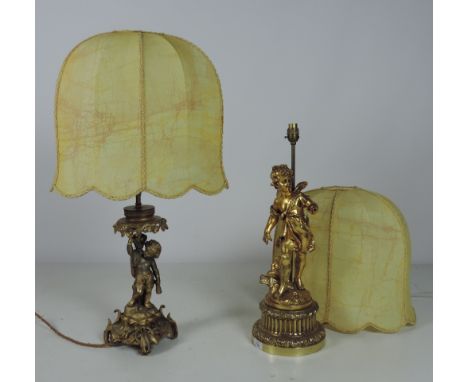 An attractive gilt metal Figural Table Lamp, and another larger similar ditto, with matching shades. (2)