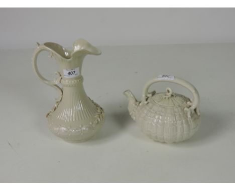 A good First Period Belleek Teapot and Cover, and an attractive Second Period lustre Jug / Vase, profusely embossed with flow