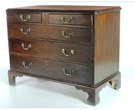 A good quality early George III mahogany Chest, the moulded top over two short and three long drawers, with brass drop handle