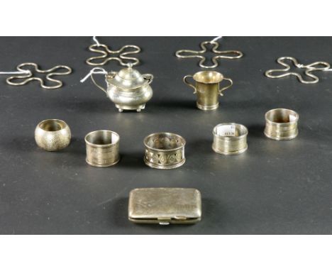 A silver boat shaped Mustard Pot, and blue liner, a silver Cigarette Holder, a small two handle Pot, 5 Napkin Rings, and 4 si