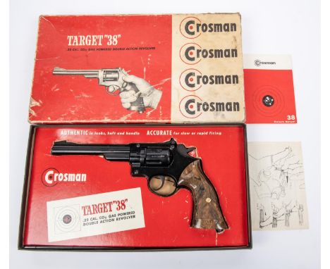 A 6 shot .177" Crosman "Target 38" double action CO2 pistol, number N78231120, with satin black finish and mottled brown plas