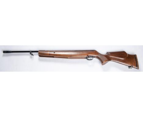 A .177" Webley Tomahawk break action air rifle, number 898362, with muzzle brake, telescopic sight grooves, dark walnut stock