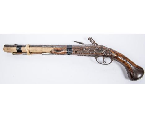 An English 18 bore flintlock holster pistol, c 1690, 20" overall, barrel 13", the breech with wavy edged recessed panels, the