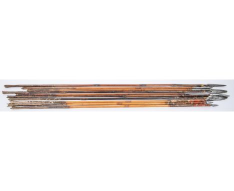 Ten 18th century Indian arrows, including a set of three with small triangular section heads and painted shafts (paint worn),