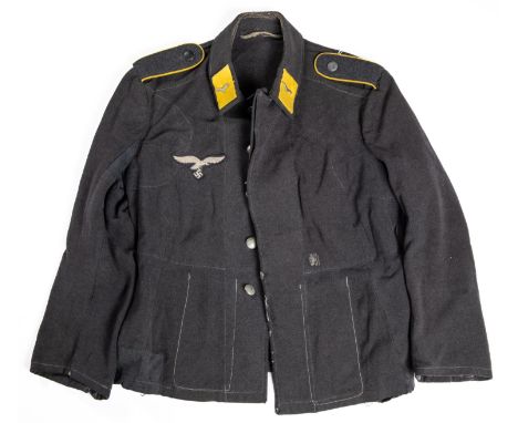A Third Reich Luftwaffe flieger blouse, complete with buttons and insignia. GC £150-200 