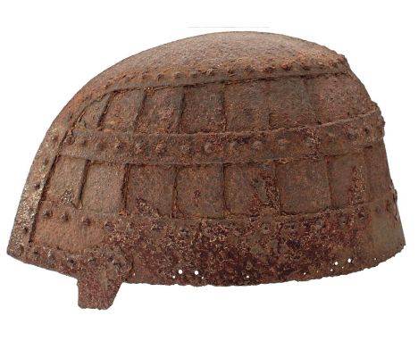 A JAPANESE KABUTO, the iron skull composed from seventeen riveted plates, braced by a head band, a mid band and a top plate, 