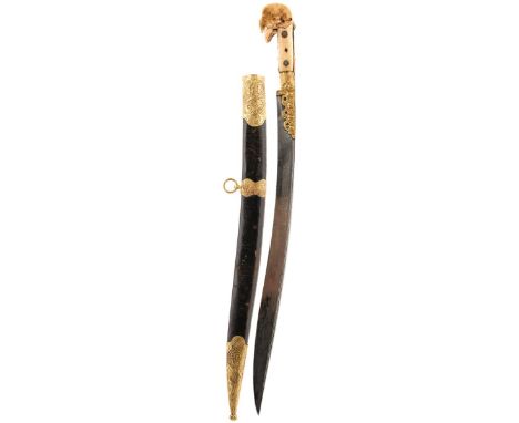 A MID 19TH CENTURY OTTOMAN OR TURKISH YATAGHAN, 60cm recurved fullered blade chiselled and reeded along the back edge, inlaid