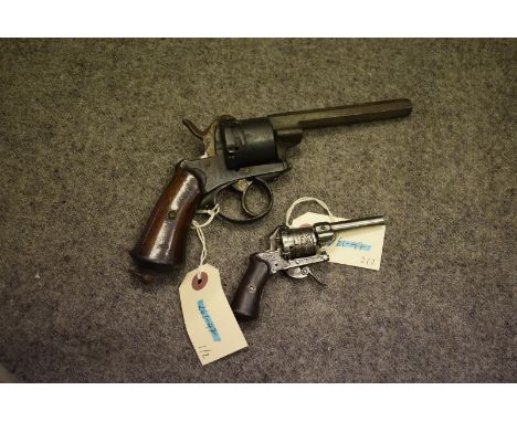 A SIX-SHOT BELGIAN PINFIRE REVOLVER, 4.75inch sighted octagonal barrel, plain cylinder and frame, two-piece varnished wooden 