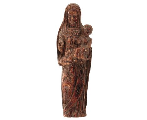 GOA, 17TH CENTURY, A CARVED IVORY GROUP OF THE VIRGIN MARY AND CHRIST CHILD, dark russett stained, 13cm high. From an establi