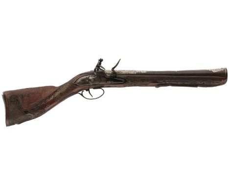 A FLINTLOCK OTTOMAN KNEE BLUNDERBUSS, 12inch sighted barrel with heavily silvered scrolling foliage decoration, border and sc