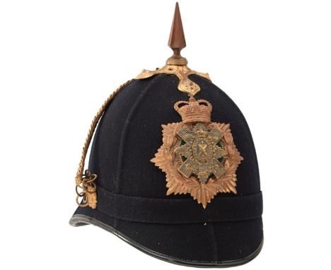 A COMPOSITE BRITISH HOME SERVICE BLUE CLOTH HELMET TO THE BLACK WATCH, the blue cloth skull, probably Police, brass mounts to