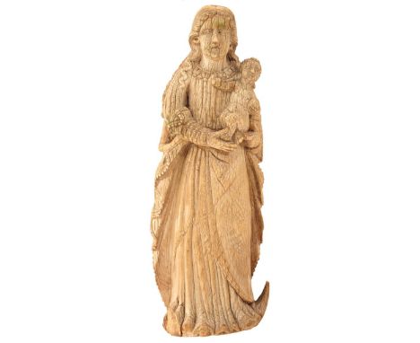 GOA, 17TH CENTURY, A CARVED IVORY FIGURE OF THE VIRGIN MARY AND CHRIST CHILD, 15cm high. From an established West Country Col