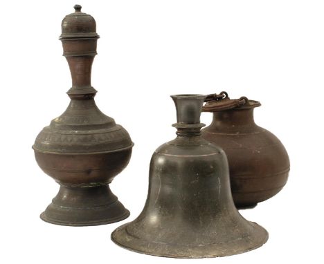 A QUANTITY OF METAL WARES, MOSTLY INDIA AND SRI LANKA, to include bowls, ewers, a large hookah pipe stand, etc. From an estab
