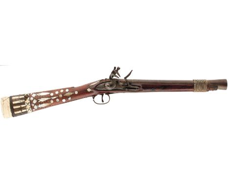 A 19TH FLINTLOCK CAUCASIAN MUSKETOON, 13.25inch two-stage barrel with flared muzzle, foliate engraved bevelled lock, characte