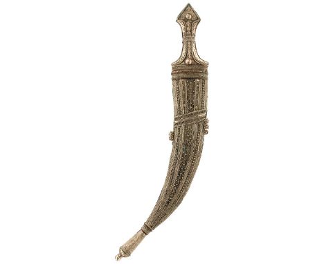 A LARGE WAHHABITE JAMBIYA, 28cm curved blade with raised medial ridge, characteristic white metal mounted hilt, decorated wit