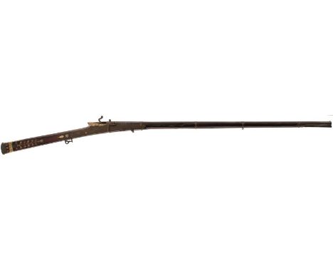 A 19TH CENTURY 22-BORE INDIAN MATCHLOCK LONGGUN, 38.5cm sighted octagonal damascus barrel, the muzzle and breech decorated wi