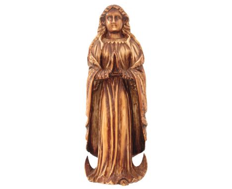 GOA, 17TH/18TH CENTURY, A CARVED IVORY GROUP OF THE VIRGIN MARY, 15cm high. From an established West Country Collection.