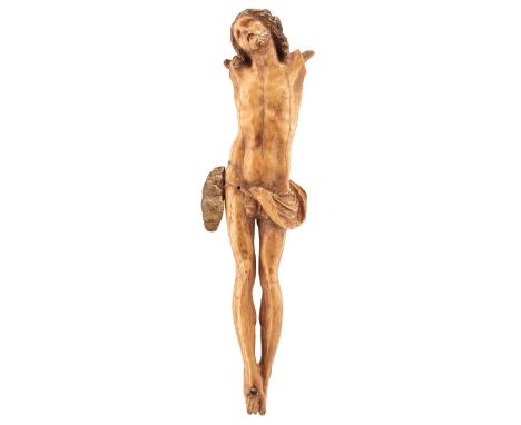 POSSIBLY GOA, 18TH CENTURY, A CARVED IVORY CORPUS CHRISTI, traces of polychrome decoration, lacking arms, 17cm high, together