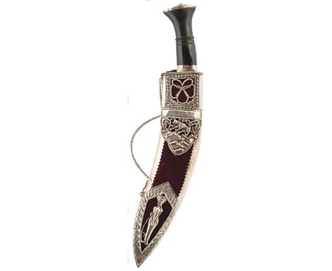 A GURKHA REGIMENT KUKRI, 26cm clean blade, white metal hilt with horn grip, contained in its pierced white metal mounted scab