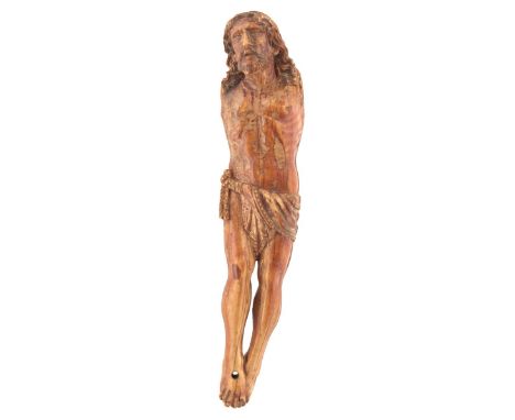 GOA, 18TH CENTURY, A CARVED IVORY CORPUS CHRISTI, russet stained, lacking arms, 19.5cm high. From an established West Country