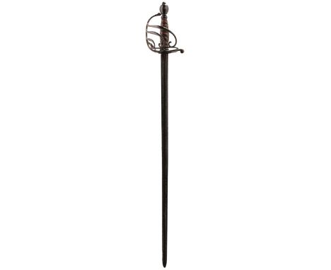 AN 18TH CENTURY CAVALRY OFFICER'S SWORD, 68cm fullered blade stamped with a K at the forte, characteristic hilt composed of s