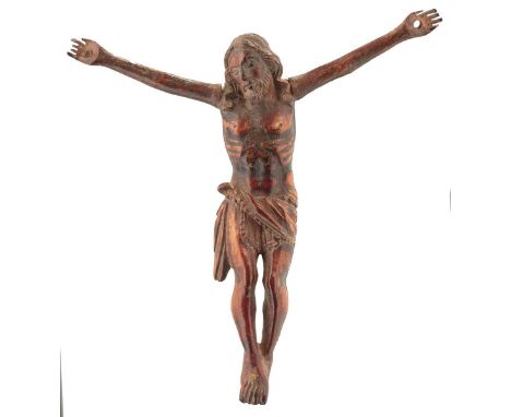 GOA, 18TH CENTURY, A CARVED IVORY CORPUS CHRISTI, russet stained, later arms, 14.5cm high over all, another 17th Century, lac