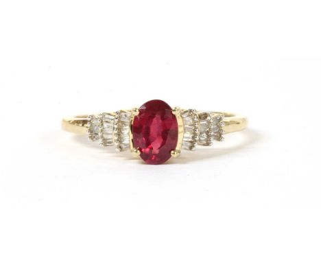 A gold fracture filled ruby and diamond ring, an oval mixed cut fracture filled ruby, approximately 7 x 5mm, claw set to grad