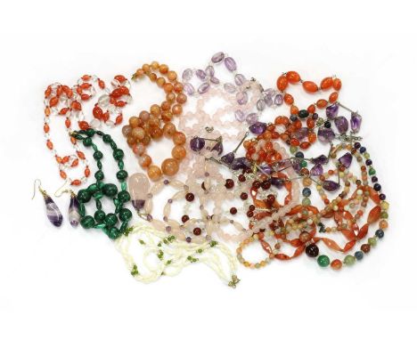 A quantity of hardstone bead and semi-precious bead necklaces, to include a graduated malachite bead necklace, a tumbled amet