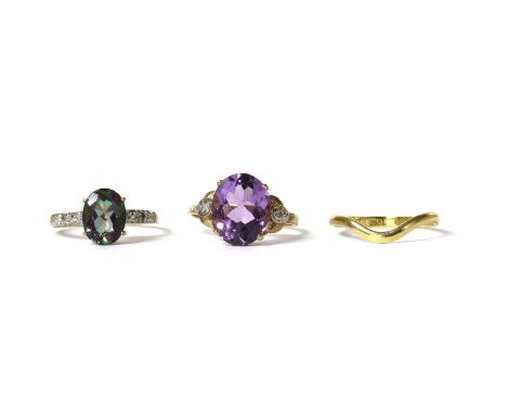 An 18ct gold shaped band ring, by Brown &amp; Newirth, London 1991, together with a gold amethyst and diamond three stone rin