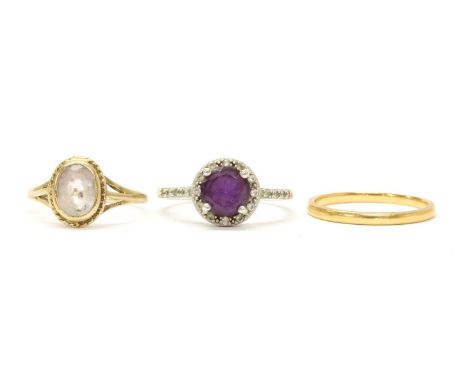 A 22ct gold wedding ring, Birmingham 1935, 1.79g, together with a 9ct gold quartz set ring, Birmingham, 1.31g, and a silver a