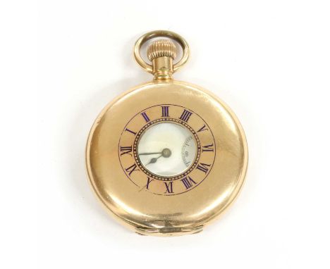 A rolled gold Waltham half hunter pocket watch, 51mm diameter, with blue enamel Roman numerals to the front cover, a white en
