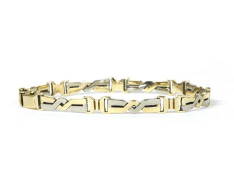 A two colour gold bracelet, with white and yellow gold twist design links, to a box clasp and figure of eight safety catch, t