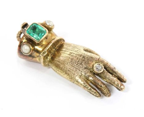 An 18ct gold emerald, diamond and split pearl Regency-style hand clasp, with a textured finished and having a cuff run set wi