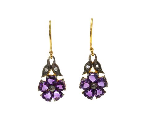 A pair of silver and gold, amethyst and diamond drop earrings, a cluster of heart shaped mixed cut amethysts, surmounted with