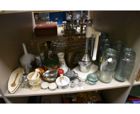 A quantity of vintage kitchenalia including Kilner jars, juice press, ceramic straining funnel, pie funnels etc.