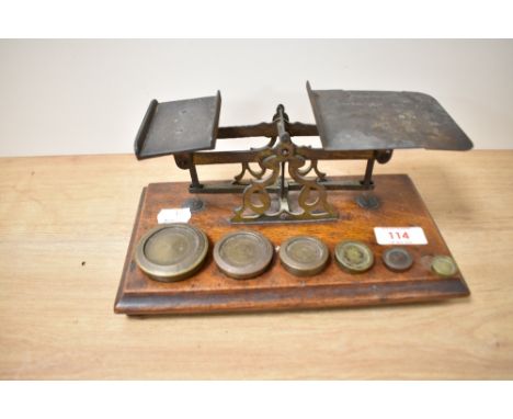 A set of Victorian postal scales and weights, measuring 23cm long